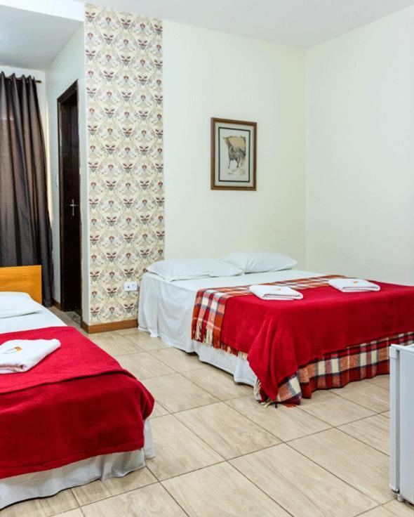 Hotel Pousada Icarai โปโซส เด คาลดัส ภายนอก รูปภาพ